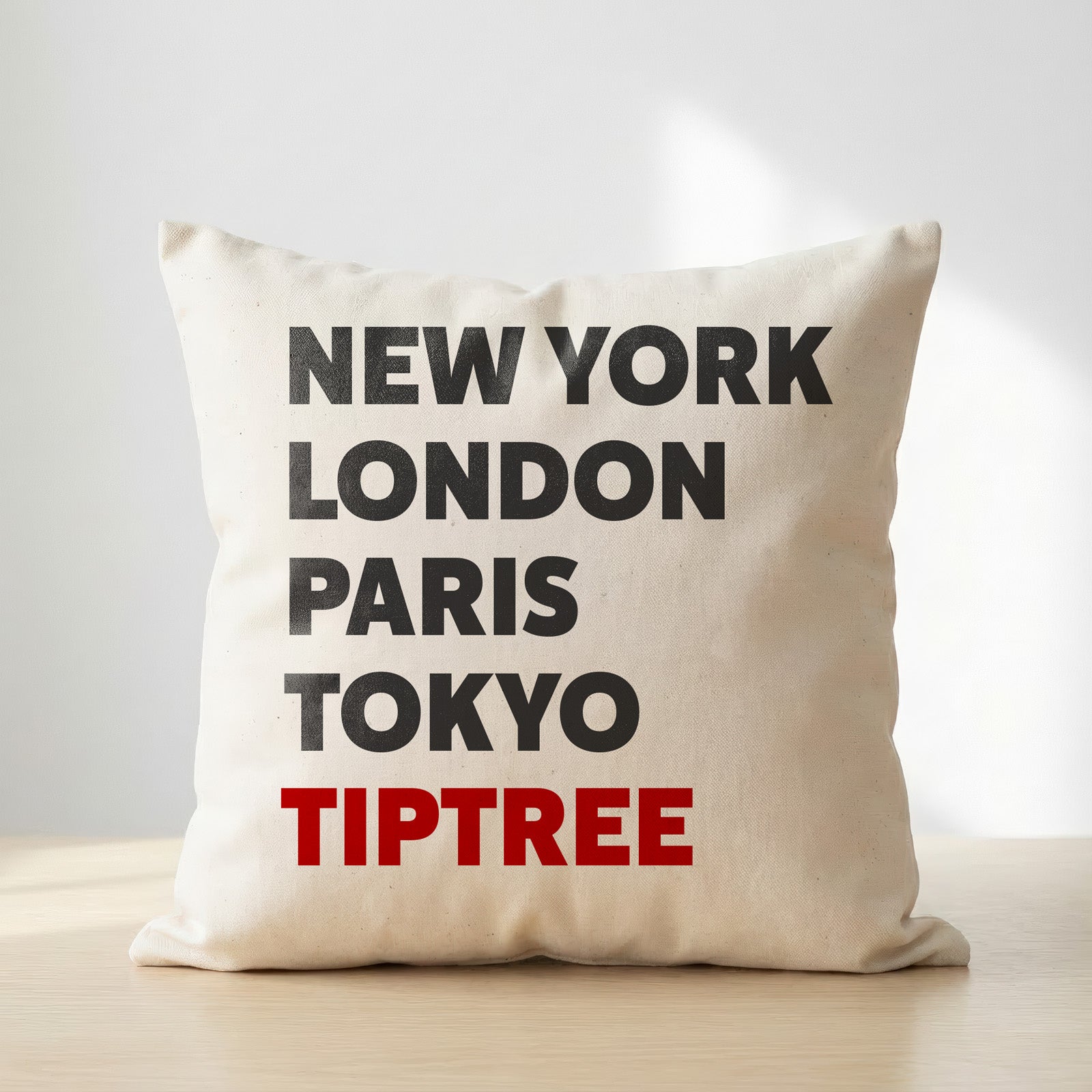 Tiptree typography cushion
